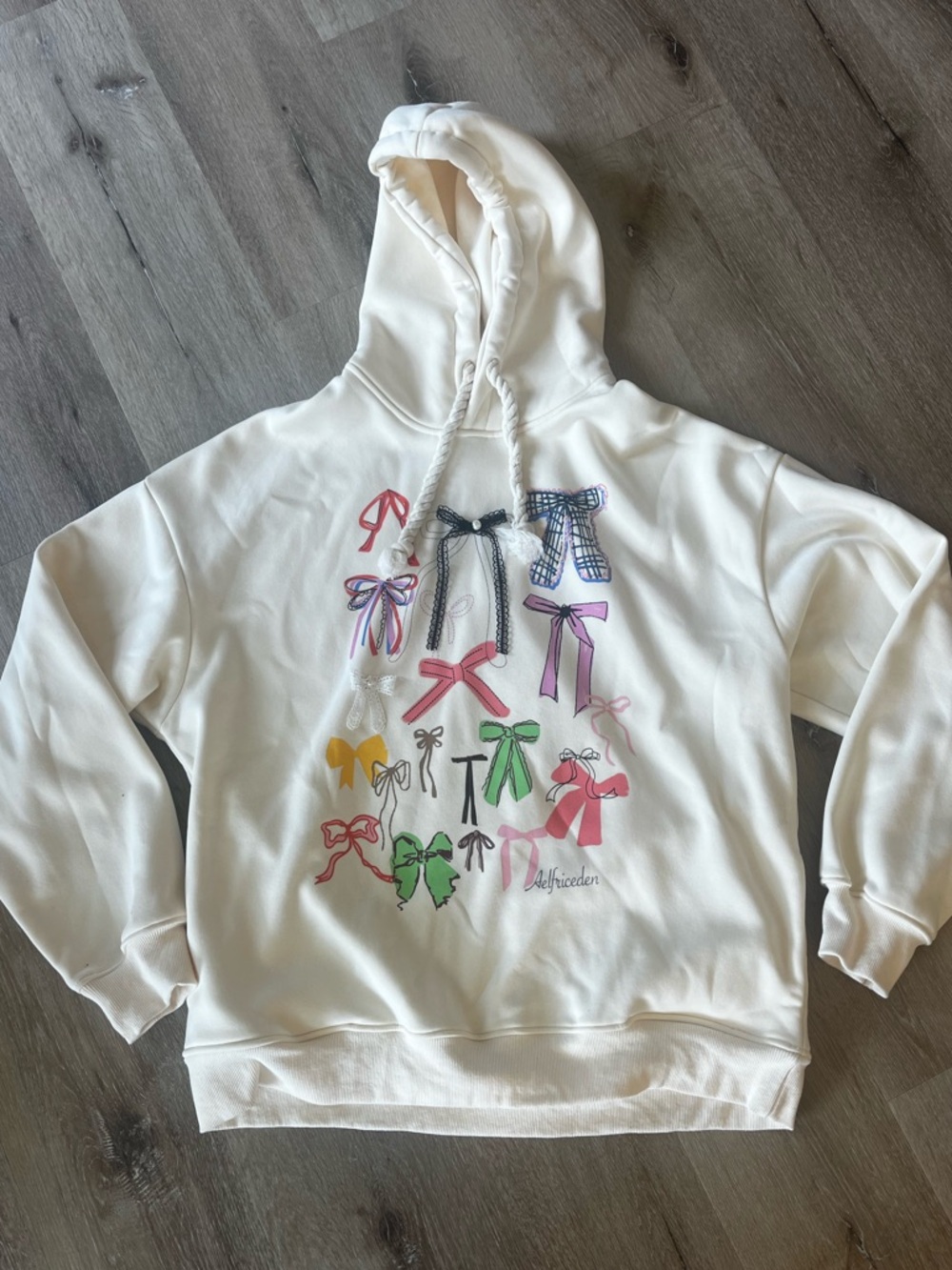 Aelfric Eden Cream Hoodie with Multicolored Bow Motif